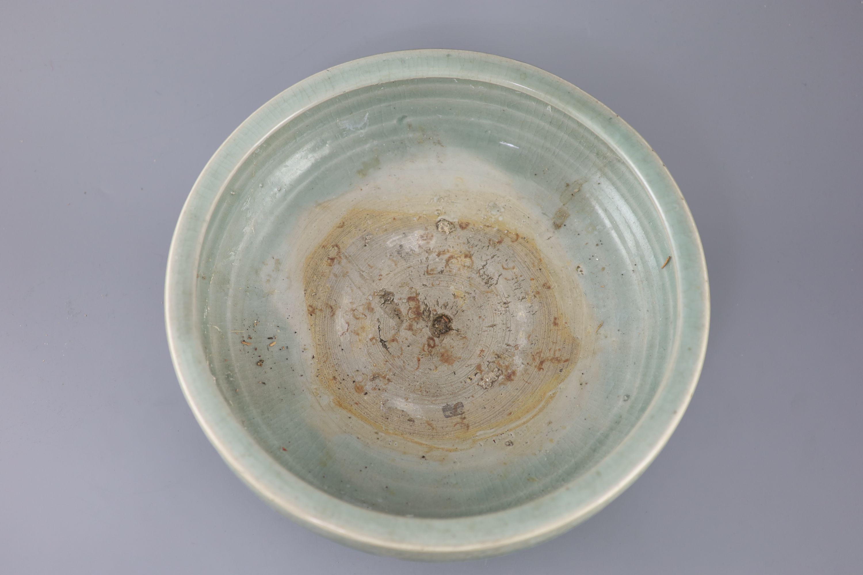 A large Chinese Longquan celadon tripod censer, Ming dynasty, 15th century, 31cm diameter